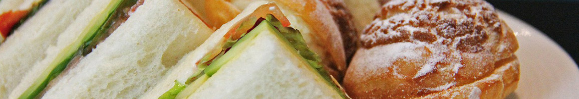 Eating Sandwich at Sandwich Zone restaurant in Berkeley, CA.